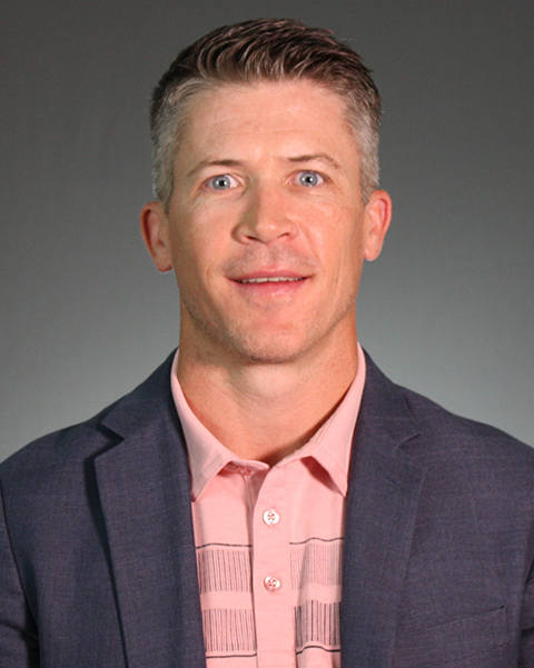 Headshot of Brett Purcell.